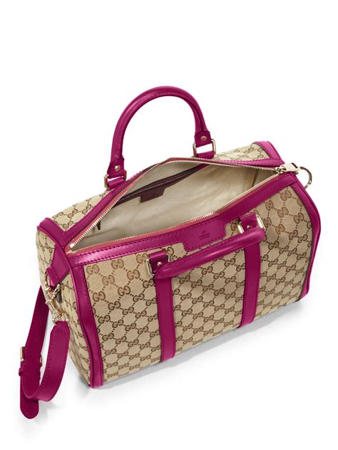 pink and brown gucci purse